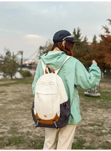 Color-blocked college student backpack, large capacity travel hiking daypack for teen girls.