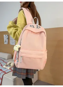 Zaino rosa casual semplice per donna, leggero stile ins, ideale per la scuola e l'uso quotidiano.