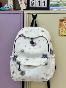 Cute star print school backpack with bow details, trendy student daily daypack for teen girls.