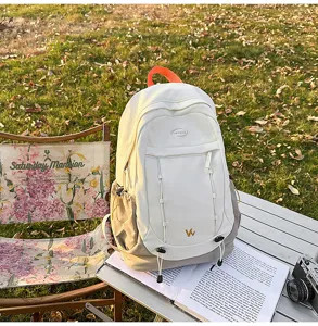 Stylish color-blocked student backpack with large capacity for daily and outdoor hiking use.