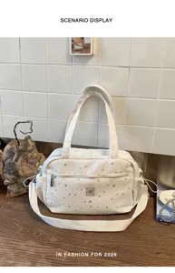 White star-patterned canvas tote bag with shoulder strap, casual commuter bag for students.