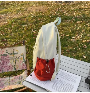 Casual colorblock school backpack for students, large capacity outdoor daypack for travel.