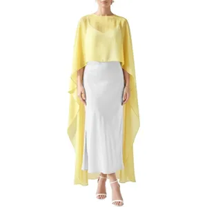 Elegant yellow chiffon cape with white slip dress evening gown, chic European women fashion apparel.