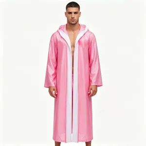 Pink hooded boxing robe detail, shiny fabric and white trim for martial arts combat.