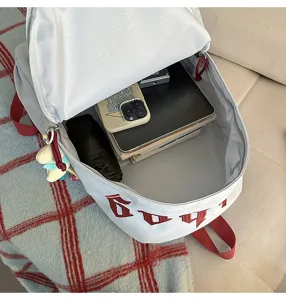 Zaino casual bianco vista interna che mostra una capiente capacità di stoccaggio e tasche.