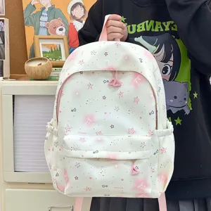 Cute aesthetic pink star backpack for student girls, sweet casual school book bag with pockets.