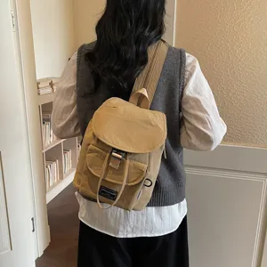 Casual nylon backpack for women, stylish minimalist solid color school book bag and daily commute.