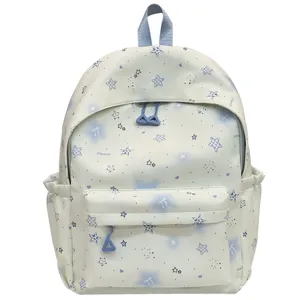 Cute star print aesthetic backpack for teen girls, fresh school bag with multiple pockets.