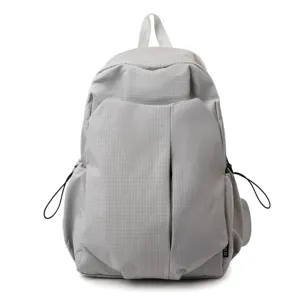 Japanese minimalist grid backpack for men, large capacity commuter travel school daypack.