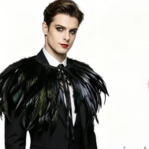 Detail view of gothic black feather cape for Halloween cosplay, dark party accessory and costume.