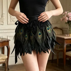 Black feather mini skirt with peacock eye pattern, elegant gothic wrap skirt for studio photography.