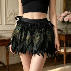 Black feather skirt with peacock feather decoration and waist ribbon bow for fashion wear.