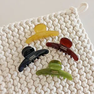 Elegant acetate hair claw set featuring multi-color chic shark clips for women daily styling.
