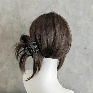 Black hair claw clip for thick hair, stylish geometric hair styling accessory for women.