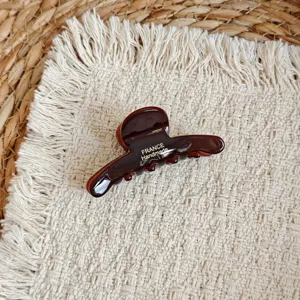 Brown acetate hair claw clip for women, elegant Korean style shark clip for hair design.