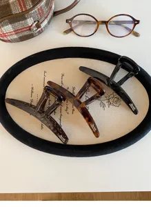 Retro tortoise shell hair claw clip set, elegant geometric design for thick hair styling.