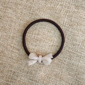 Elastico per capelli semplice con fiocco in acetato da donna, grazioso accessorio quotidiano.