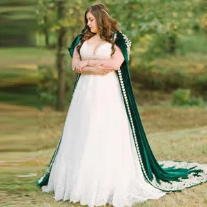 Dark green velvet bridal cloak with gold embroidery, perfect for wedding and special events.