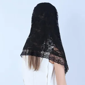 Black lace veil detail showing the floral embroidery and elegant drape on a model's head.