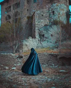 Detailed view of a dark teal hooded cloak cape, perfect for Halloween stage costume and cosplay.