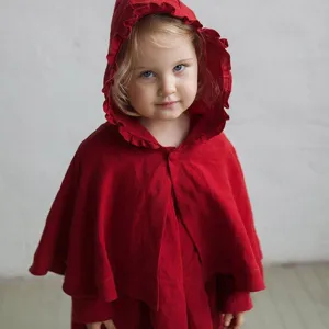 Red hooded children cape detail, cute winter cloak with ruffled brim for kids daily wear.
