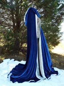 Detail view of the royal blue velvet hooded cloak with white lining, ideal for costume use.