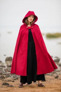 Red hooded woolen cape cloak for women, warm winter outerwear, elegant vintage style outfit detail.