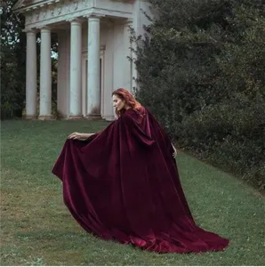 Burgundy velvet hooded cloak detail, elegant medieval cape for cosplay, soft fabric and flowy design.