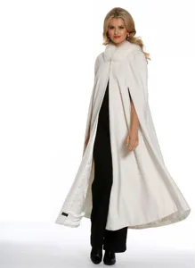 Elegant white bridal cape with plush fur collar, perfect for winter weddings and formal events.