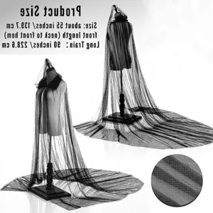 Detailed close-up view of the black hooded cape mesh fabric and dramatic long train design.