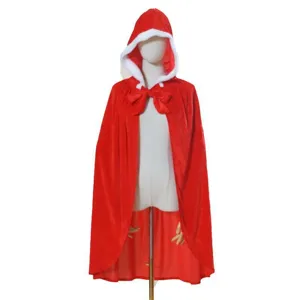 Detailed view of the red hooded Christmas cape featuring white faux fur trim and a cute bow tie.