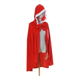 Detailed view of the red Christmas hooded cape with white plush trim and front bow tie.