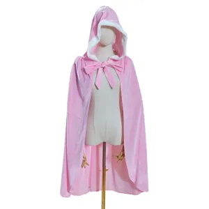 Pink velvet hooded cape with white plush trim and front bow tie, shown on mannequin.