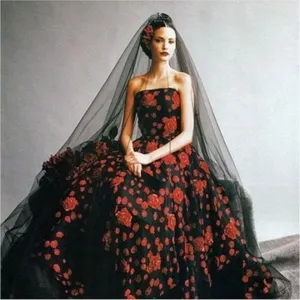 Black bridal veil and red rose dress detail shot, vintage style photography prop for studio.