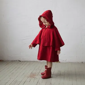 Red hooded kids cloak with ruffle brim, cute winter cape for children and toddlers.