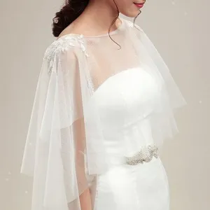 Exquisite white bridal mesh cape for wedding dress, elegant lace applique and sheer design.