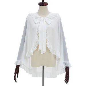 Detailed view of the white chiffon ruffled cape, lightweight fabric and delicate bow tie design.