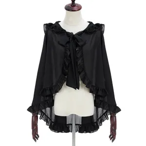 Detailed view of the black chiffon cape featuring delicate ruffles and a cute bow tie.