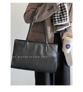 Classic black large capacity shoulder tote bag for women, stylish commuting PU bag.