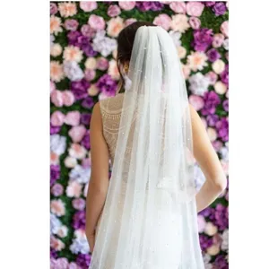 Long chapel bridal veil with pearls and comb, elegant wedding mesh headpiece for women.