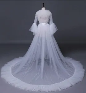 White tulle bridal cape detail, long sleeve wedding dress cloak, sheer evening gown cover up.