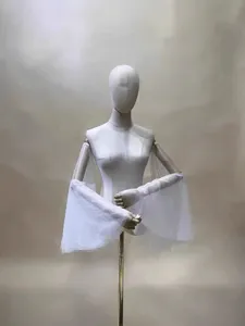Detachable white mesh trumpet sleeves for wedding dress, elegant arm cover accessory detail view.
