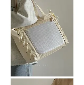 Große Canvas Tragetasche mit süßer Schleife und transparentem Mesh-Sichtfenster.
