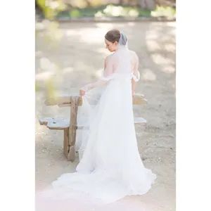 Elegant long bridal veil for wedding gown, white wedding veil with soft tulle fabric.