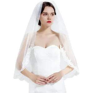 Elegant embroidered bridal veil with comb, short white mesh wedding accessory for brides.
