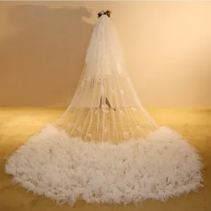 Bridal wedding long cathedral veil with 3d flowers and stunning dramatic train for bride.