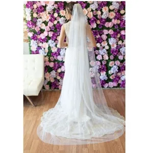 Long cathedral wedding veil with pearls and comb for bridal wedding photography and party