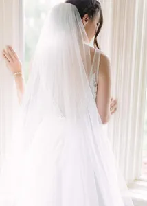 Exquisite details of long double layer wedding bridal veil with soft mesh and elegant design.