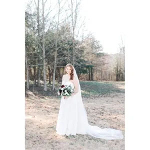 White double layer long trailing wedding bridal veil with comb for stunning photography.