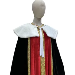 Velvet cloak detail view, plush white collar, red and black fabric with golden trim.
